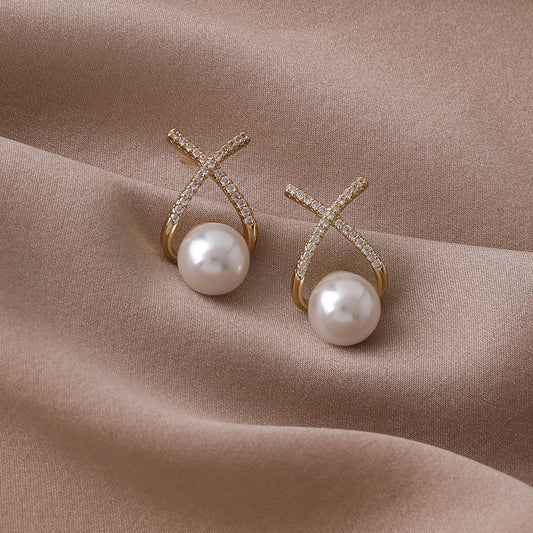 The Crossover Pearl Studs