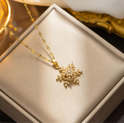 Lilyah Jewelry Gold Plated Zircon Diamond Adjustable Necklace. Stunning and elegant. Gift for her. Gold necklace with a snowflake pendant on a beige jewelry box