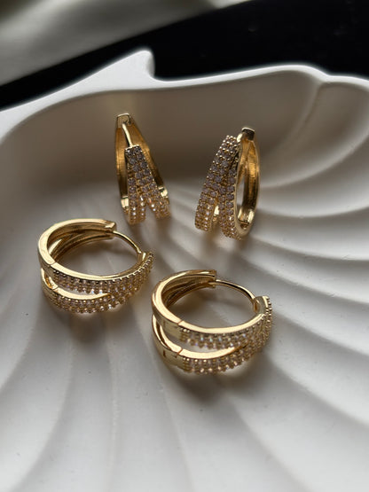 Lilyah Jewelry Gold Plated diamon Earrings.  double hoop earrings on a white textured surface