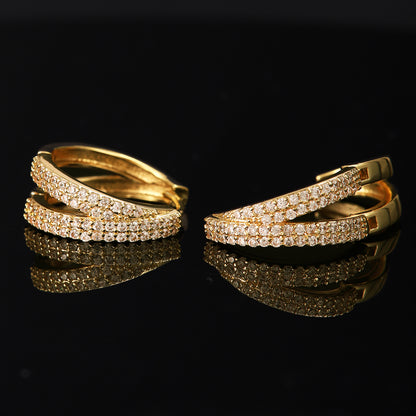 Lilyah Jewelry Gold Plated Earrings.  Two layered earrings with diamond accents on a black background