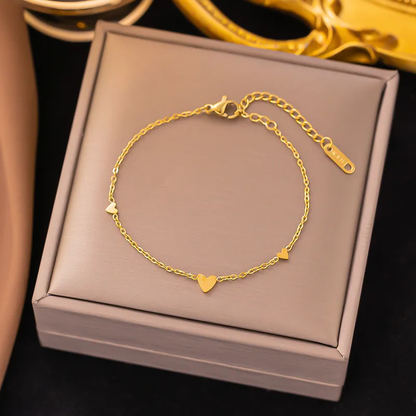 A gold-plated heart link bracelet presented in a branded box, with the bracelet displaying multiple small heart-shaped pendants. Lilyah Jewelry Gold Plated Delicate Bracelet . Stunning, minimalistic and elegant. Gift for her