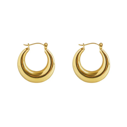 A pair of 18k gold plated chunky hoop earrings on a white background. Lilyah Jewelry Gold Plated Earring. Gift Ideas for her.