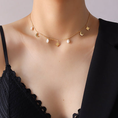 A woman wearing a black tank top with lace details, showcasing a 18k gold plated necklace with dainty celestial charms, including moons and stars, attached to a 304 stainless steel chain. Lilyah Jewelry Gold Plated necklace. Gift Ideas for her.