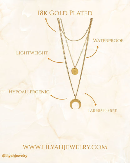 Gold necklace with text highlighting features on a light background. The luna 18k gold plated necklace is lightweight, waterproof, hypoallergenic and anti tarnish.